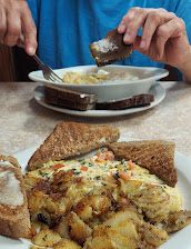 Cheese Omelet With Tomato Onion Home Fries And Wheat Toast